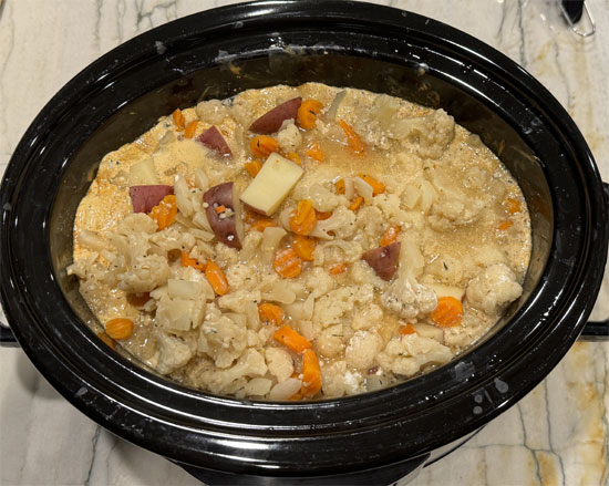 Set an alarm and stir the ingredients once every hour.