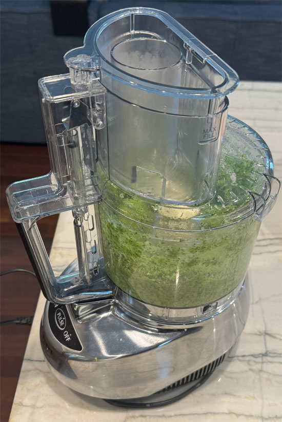4. Pour the broccoli mixture into a blender or food processor, filling it no more than halfway full. Puree in batches until smooth and pour into a large mixing bowl. (You really want to make sure it's smooth. If it's not, it will have a gritty mouthfeel.)