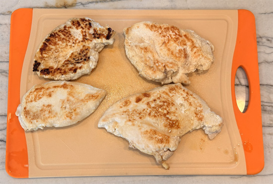 Flip once, cook another 5 minutes. Rest 5 minutes before cutting into bite sized pieces.