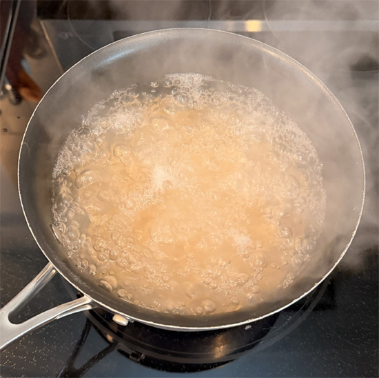 Add the pasta to the boiling water, stir, and return it to a rapid boil. Reduce the heat to medium and cook uncovered, stirring occasionally, 11 to 13 minutes.