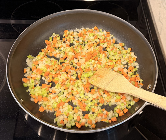 In a large pot or deep skillet, heat the olive oil over medium heat. Add the onion, celery, and carrots and cook, stirring occasionally, until softened, about 5–7 minutes.