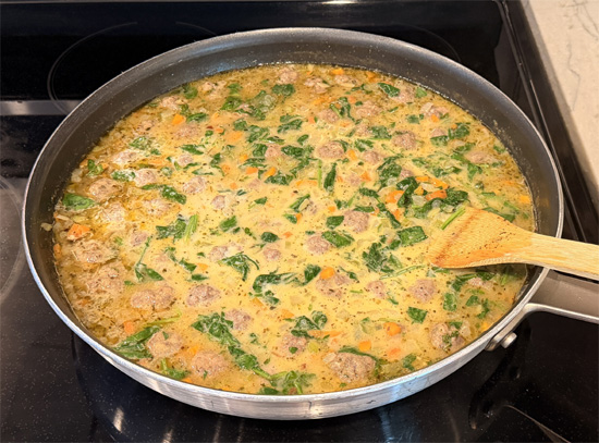 Reduce the heat to medium-low. Slowly stir in the fat-free half & half and let the soup heat gently for about 1 minute. It should be hot but not boiling.