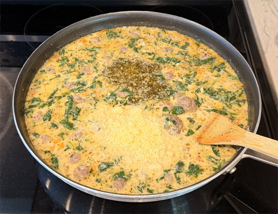 Turn the heat to low. Stir in the pesto, grated Parmesan, and lemon juice. Taste and adjust seasoning with additional salt, pepper, or red pepper flakes if desired. 