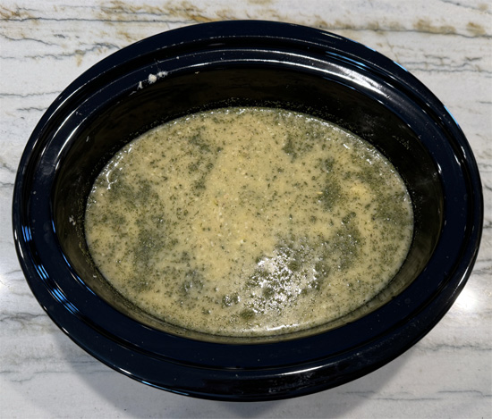 Put all the ingredients EXCEPT FROZEN PEAS into a slow cooker and stir together. Cover and cook on high for 3 hours. (You only need to cook it for 2 hours if you're using white rice, but that will have much less fiber.)