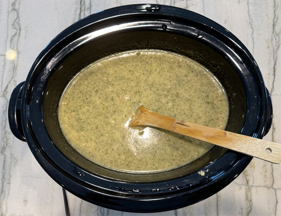 After cooking for 3 hours, stir the frozen peas into the mixture and cook on high for 1 hour more. 