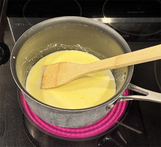Add the half & half and increase the heat to medium-high. Stir continually until the mixture just begins to boil.