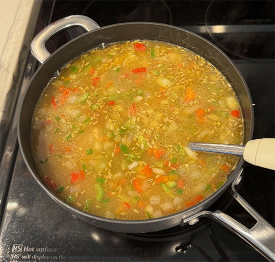Pour the entire onion mixture into the pot with the beans. Simmer for 10 minutes.